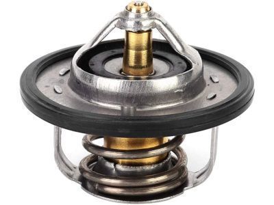 Engine thermostat with metal valve body and precision spring assembly