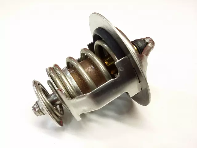 Engine thermostat with metal valve body and precision-calibrated spring assembly