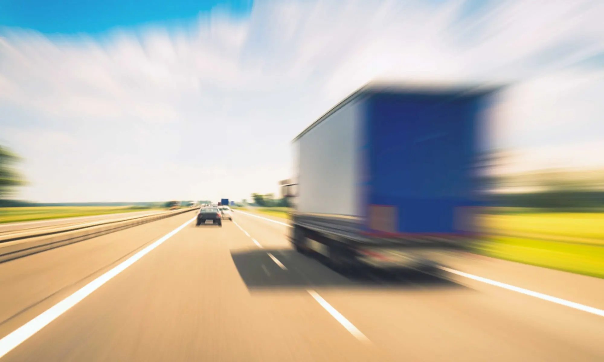 Car parts supplier delivery speed concept showing fast truck transport on highway